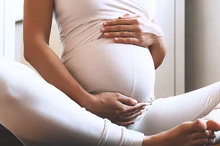 Person enjoying a prenatal massage in Scottsdale, Arizona